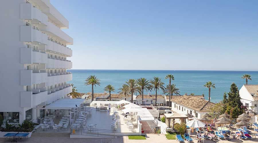 relax in the lounger of the swimming pool of the hotel palia la roca in malaga